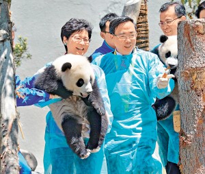 Mrs Lam (left) and the Director of Wolong Nature R
