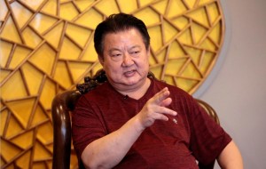 儀仗隊原大隊長程志強向記者講述回歸經曆