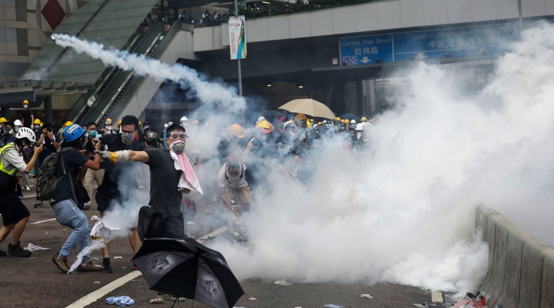 HONG KONG, HONG KONG - JUNE 12: Tear gas is seen being used to disperse the crowd of anti-extradition protestors on Harcourt Road on June 12, 2019 in Admiralty, Hong Kong, Hong Kong. (Photo by Sam Tsang/South China Morning Post via Getty Images)